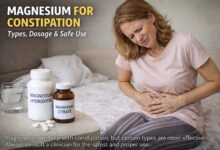 Woman with stomach discomfort illustrating constipation and magnesium laxative use