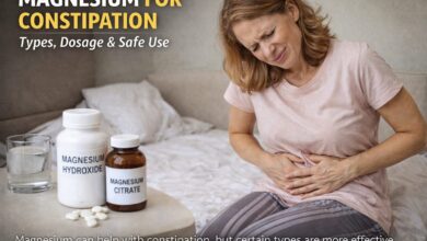Woman with stomach discomfort illustrating constipation and magnesium laxative use