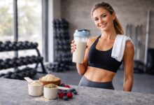 "Protein shake in blender bottle with oats and berries representing protein powder review for weight loss and satiety support"
