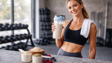 "Protein shake in blender bottle with oats and berries representing protein powder review for weight loss and satiety support"